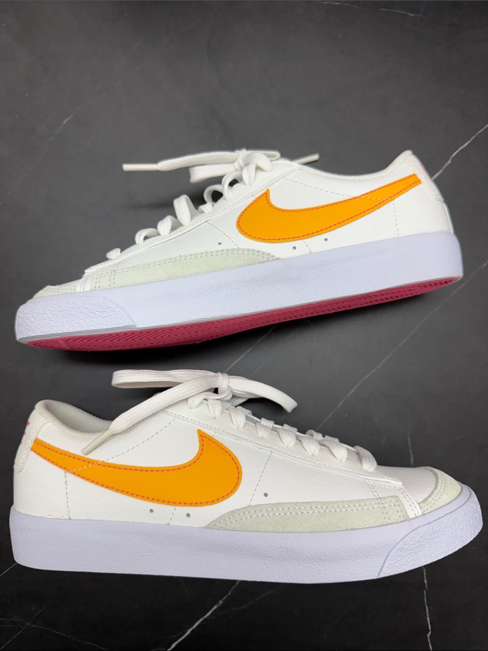 Nike White Sneakers with Bright Orange Swoosh